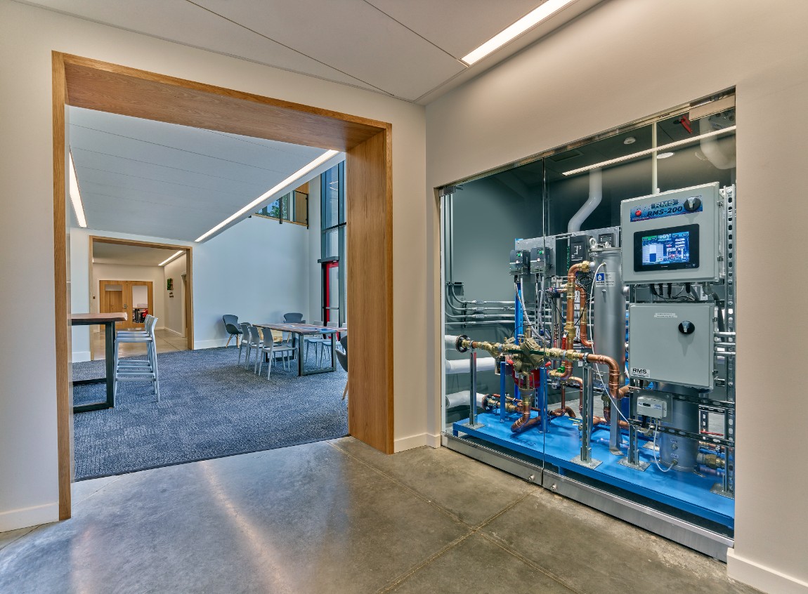 A complex-looking water recycling system inside a building.